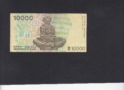 Beschrijving achterzijde: STATUE